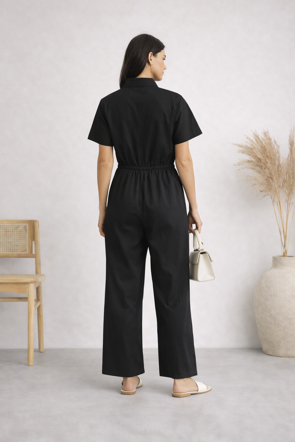 Musta jumpsuit – koko S