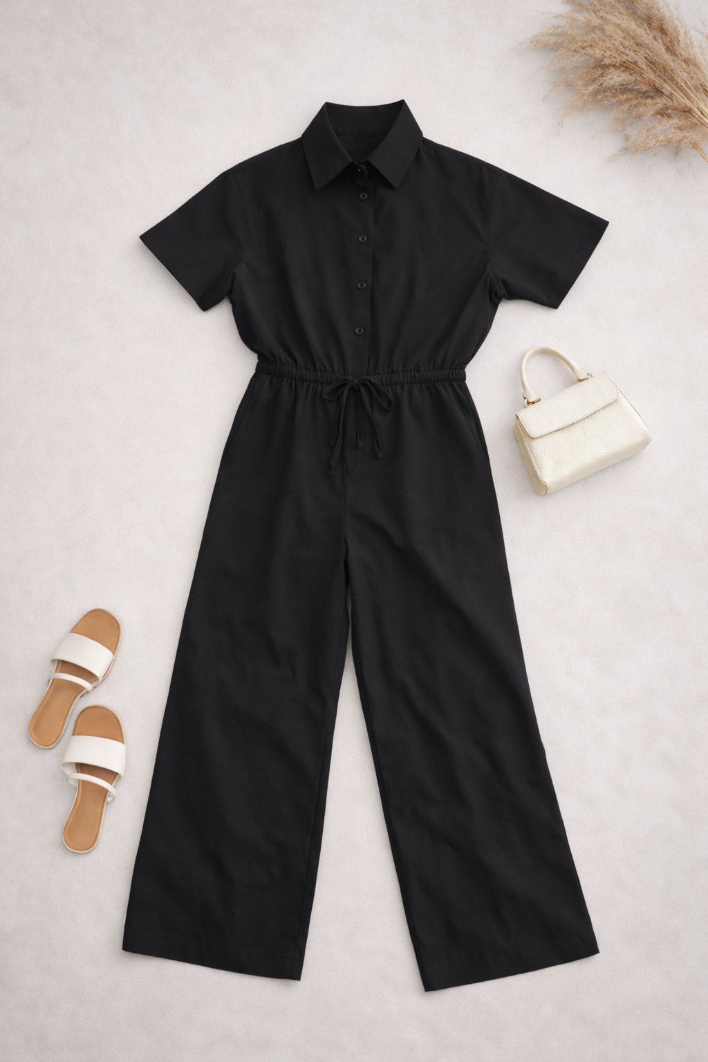 Musta jumpsuit – koko S